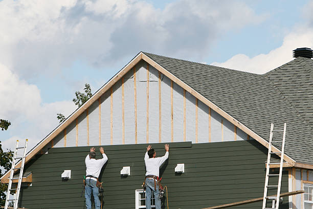 Professional Vinyl Siding technician working in Marion, CT